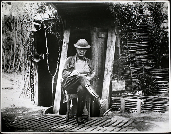 American Major outside a trench villa