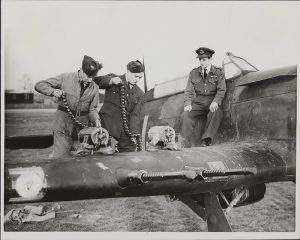 Ground crew loading up the shells on the four cannon Hurricane