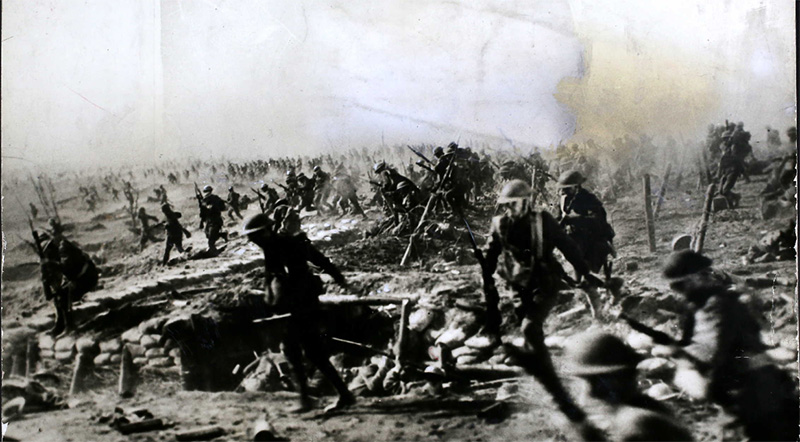 American troops charging through shell-pocked no man's land on the Hindenburg line