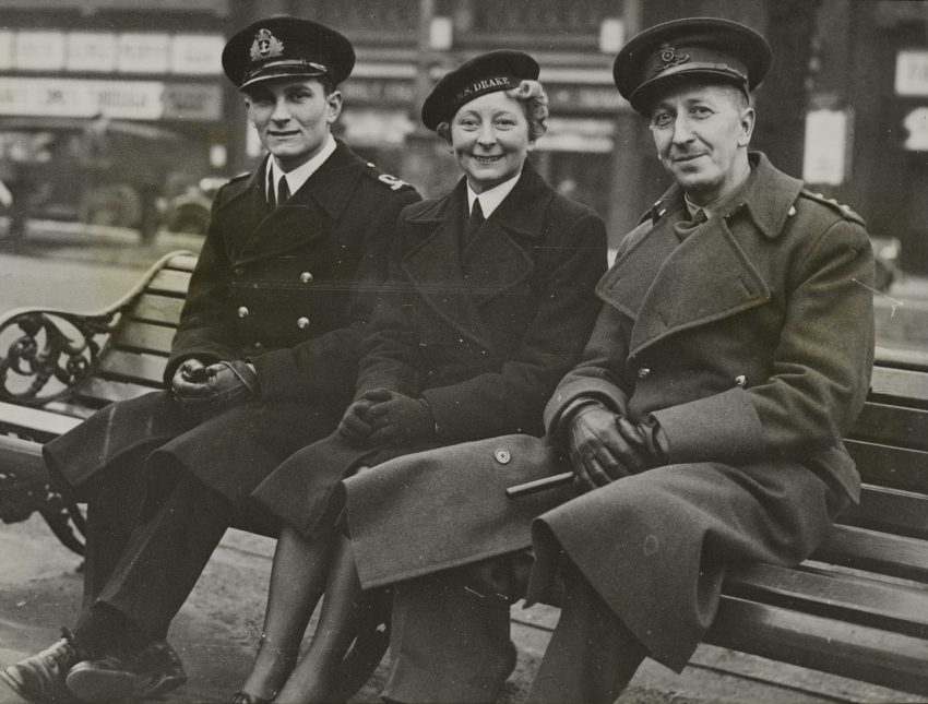 The image shows three figures of the Prentice family, Peter of Fleet Air Arm, Phyllis of the Women's Royal Naval Service and Charles of the Royal Artillery. The family were all on leave together in London. The photo is dated 17 January 1943.