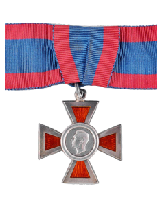 Royal Red Cross, Second Class, awarded to Marjory in December 1949. The Royal Red Cross (Second Class) is a military decoration awarded for exceptional services in military nursing. The badge for ARRC is in the shape of a silver cross, height 4mm, width 35mm, the obverse enamelled red, with broad silver edges around the enamel; a circular medallion (now bearing an effigy of the reigning monarch) at its centre. The reverse has a circular medallion bearing the Royal Cypher of the reigning monarch as well as the words "FAITH", "HOPE" and "CHARITY" inscribed on the upper limbs of the cross, with the year "1883" in the lower limb. The medal has a dark blue ribbon with crimson edges.
