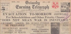 The Grimsby Evening Telegraph, published 31 August 1939, announces the impending Operation Pied Piper to its readers. The headline reads: 'Evacuation To-Morrow (Official) - For Schoolchildren and Other Priority Classes - "Does Not Mean War is Inevitable"'. The paper cost one penny. The newspaper offers useful context to anyone researching evacuees. © Newspapers.com