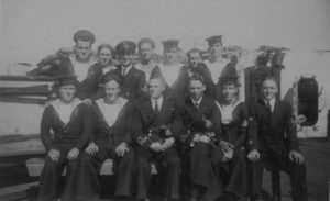 Group photo of William and his Royal Navy comrades during WWII. William is standing in the back row, third from the left. As the D-Day 80 anniversary approaches, we wonder what happened to the other men in the photo and what their D-Day stories are. Image provided by Anthony Denning. 